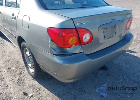 2003 Toyota Corolla Ce z USA, uszkodzony, nr VIN JTDBR32E032014854